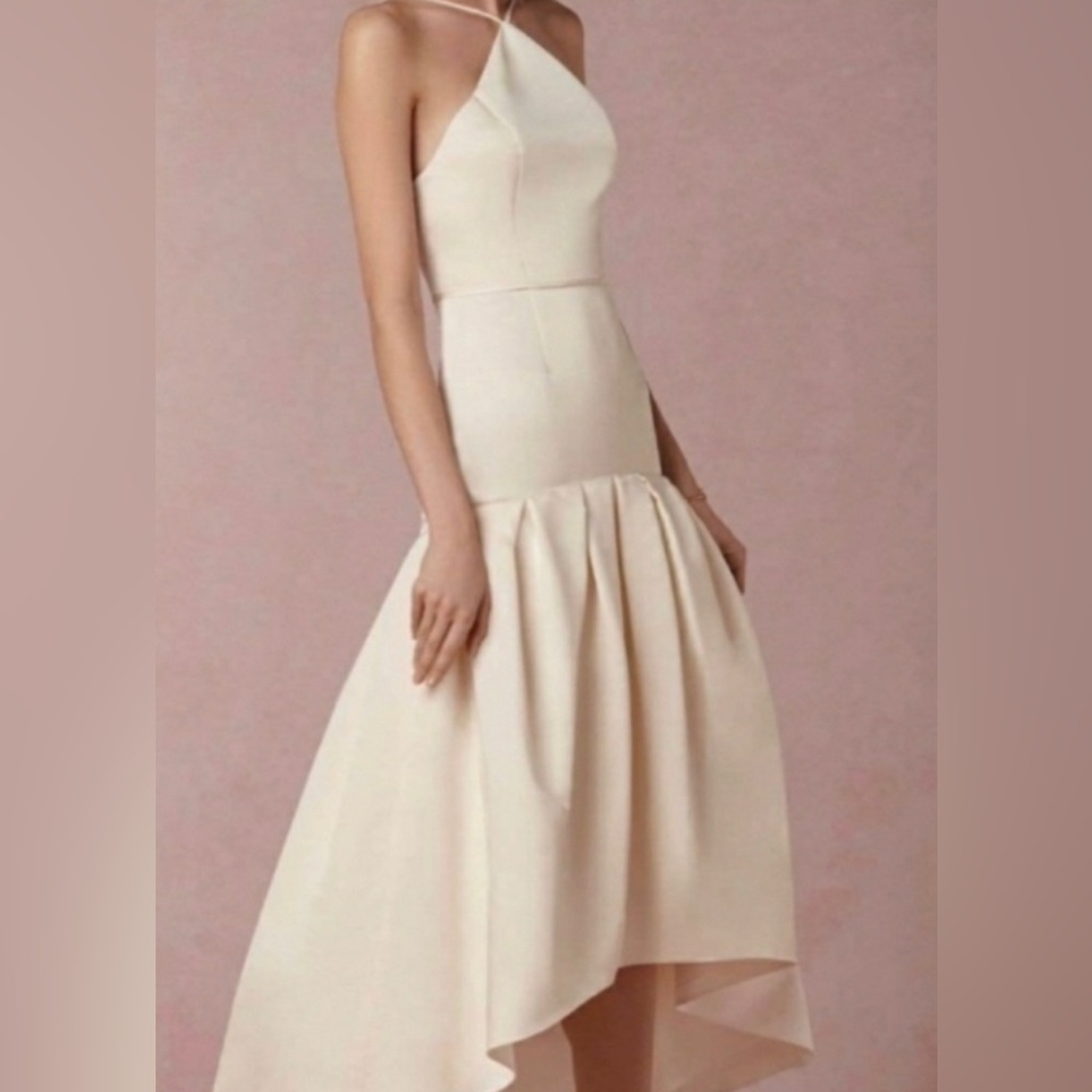 Jill Jill Stuart high or low dress. A couple Small black stains on it.